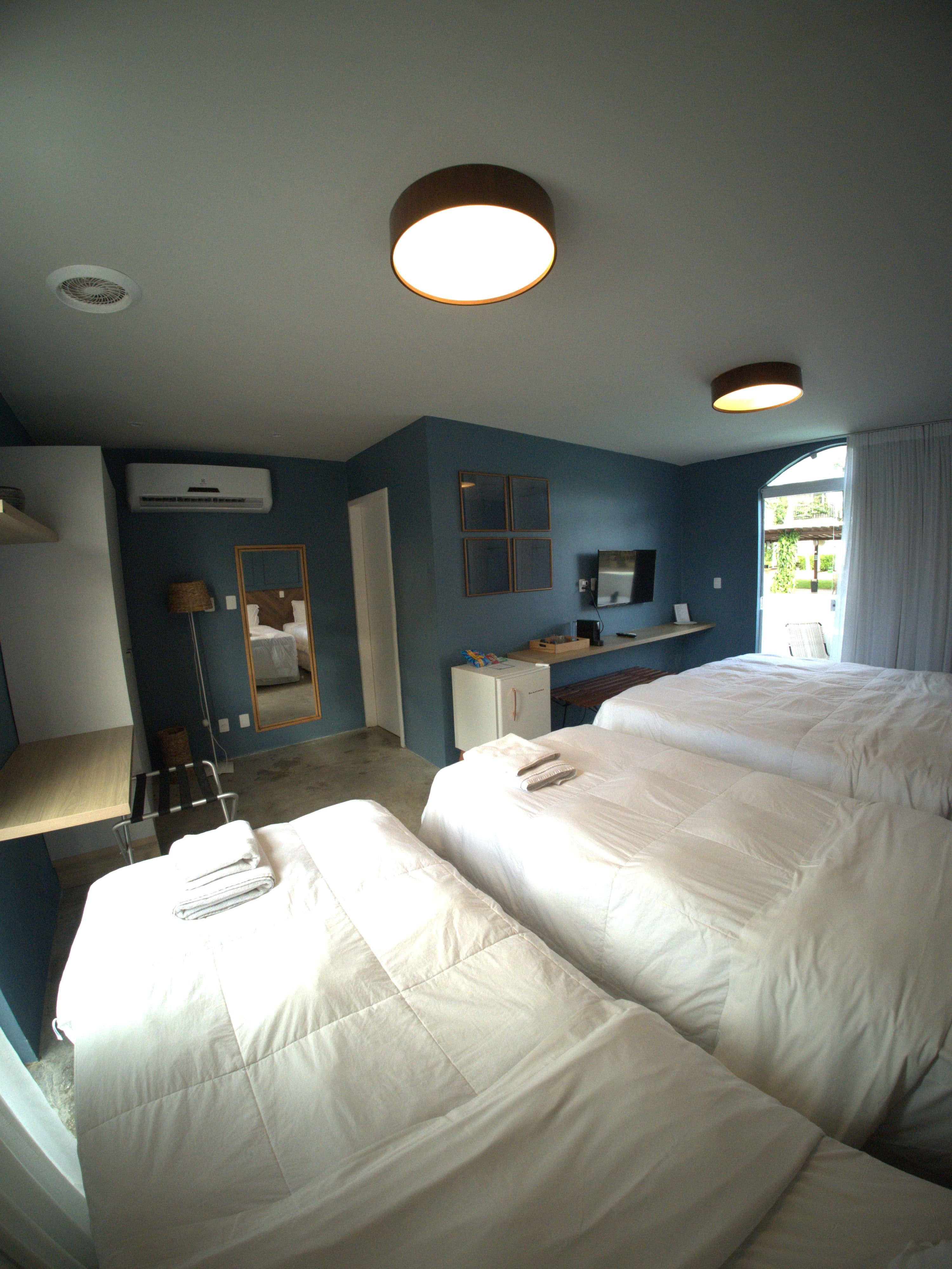 Quarto com duas camas de solteiro